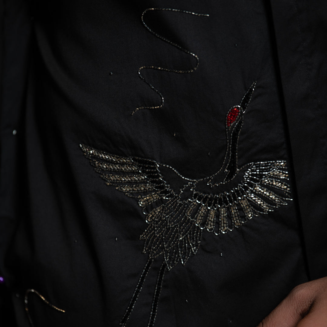 FLAMINGOS UNDER THE TROPICAL SUN