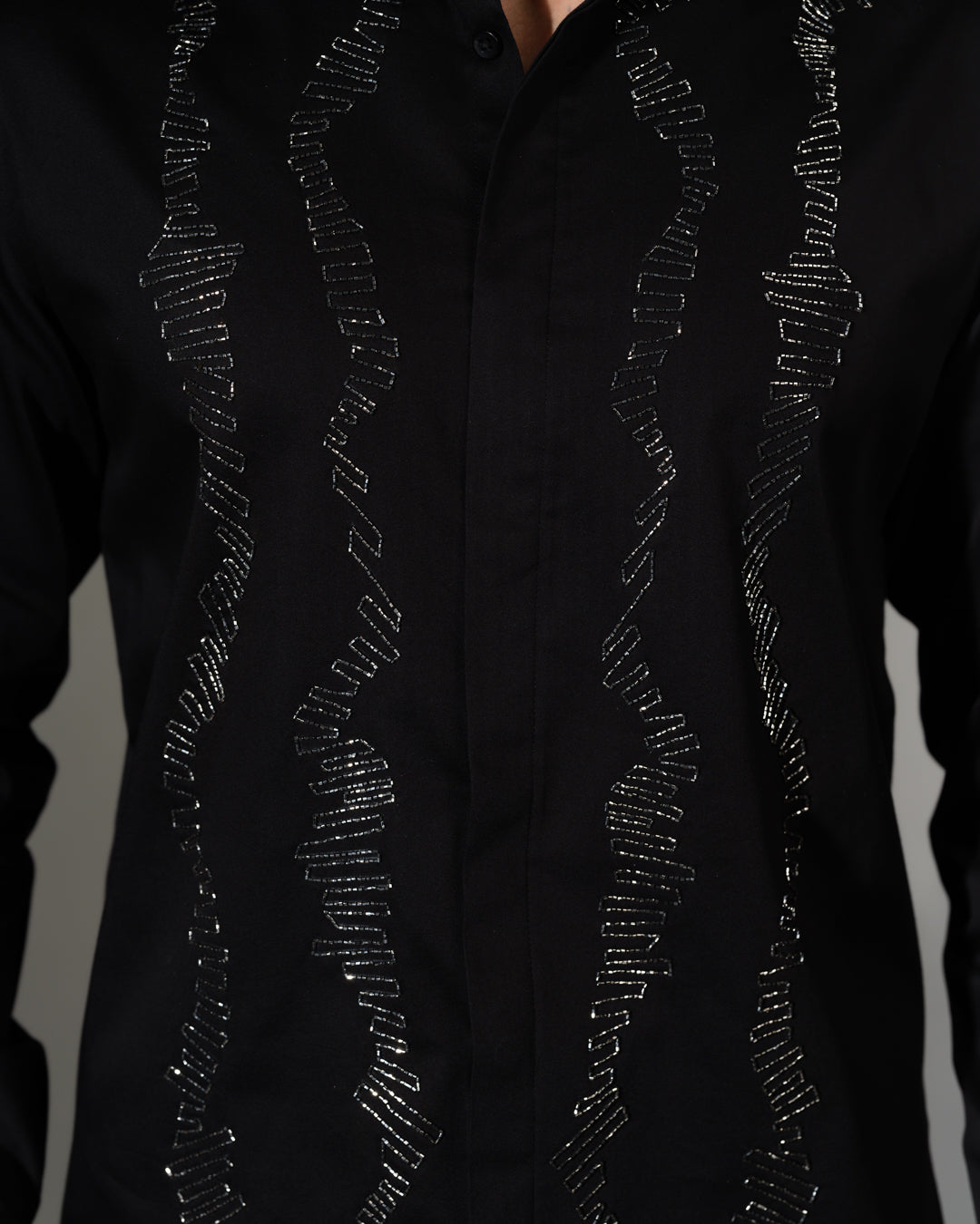 Black Texture Lines Beside the Placket